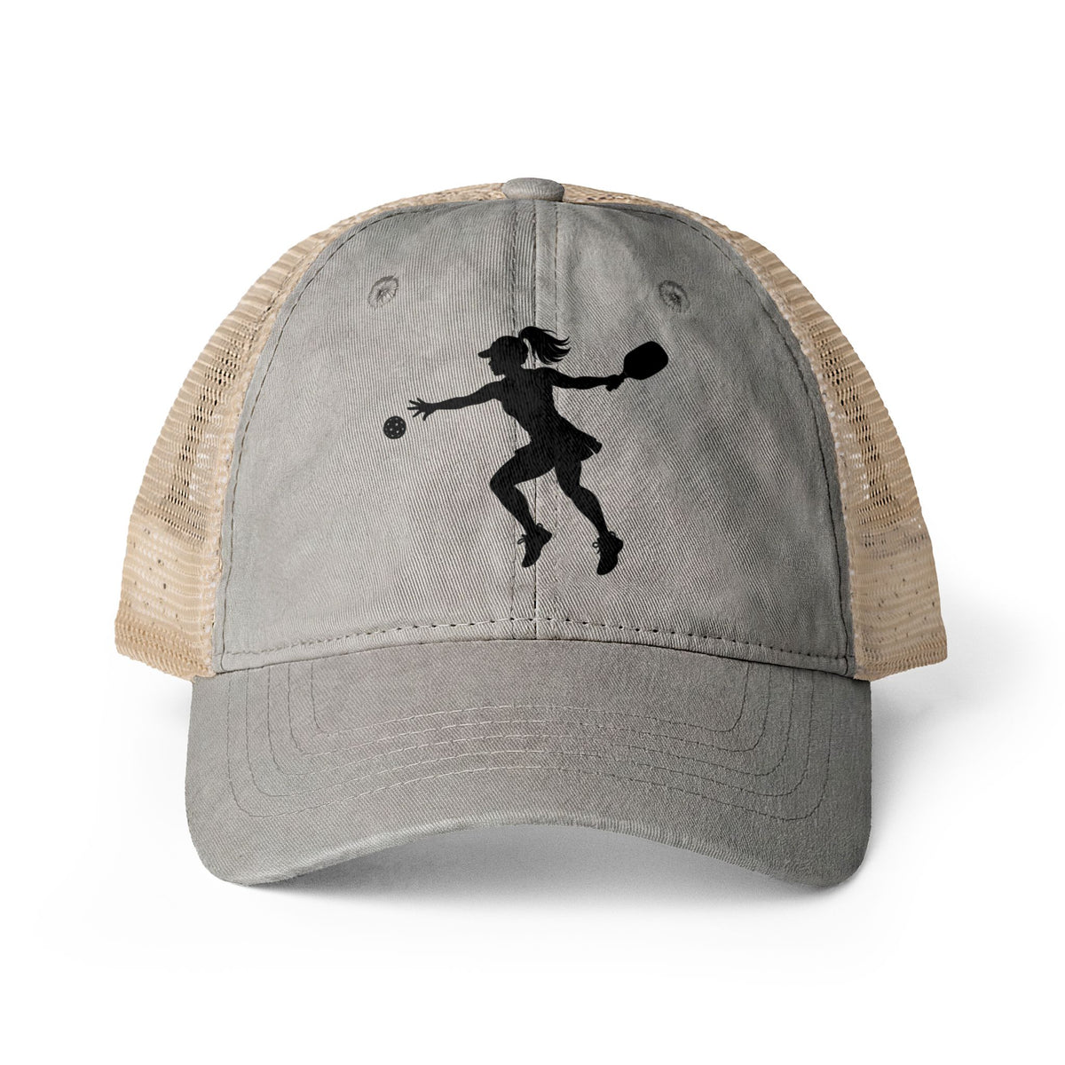 A trucker-style baseball cap with a gray washed front panel and brim, beige mesh back, featuring a black silhouette graphic of a female pickleball player on the front, shown on a white background.