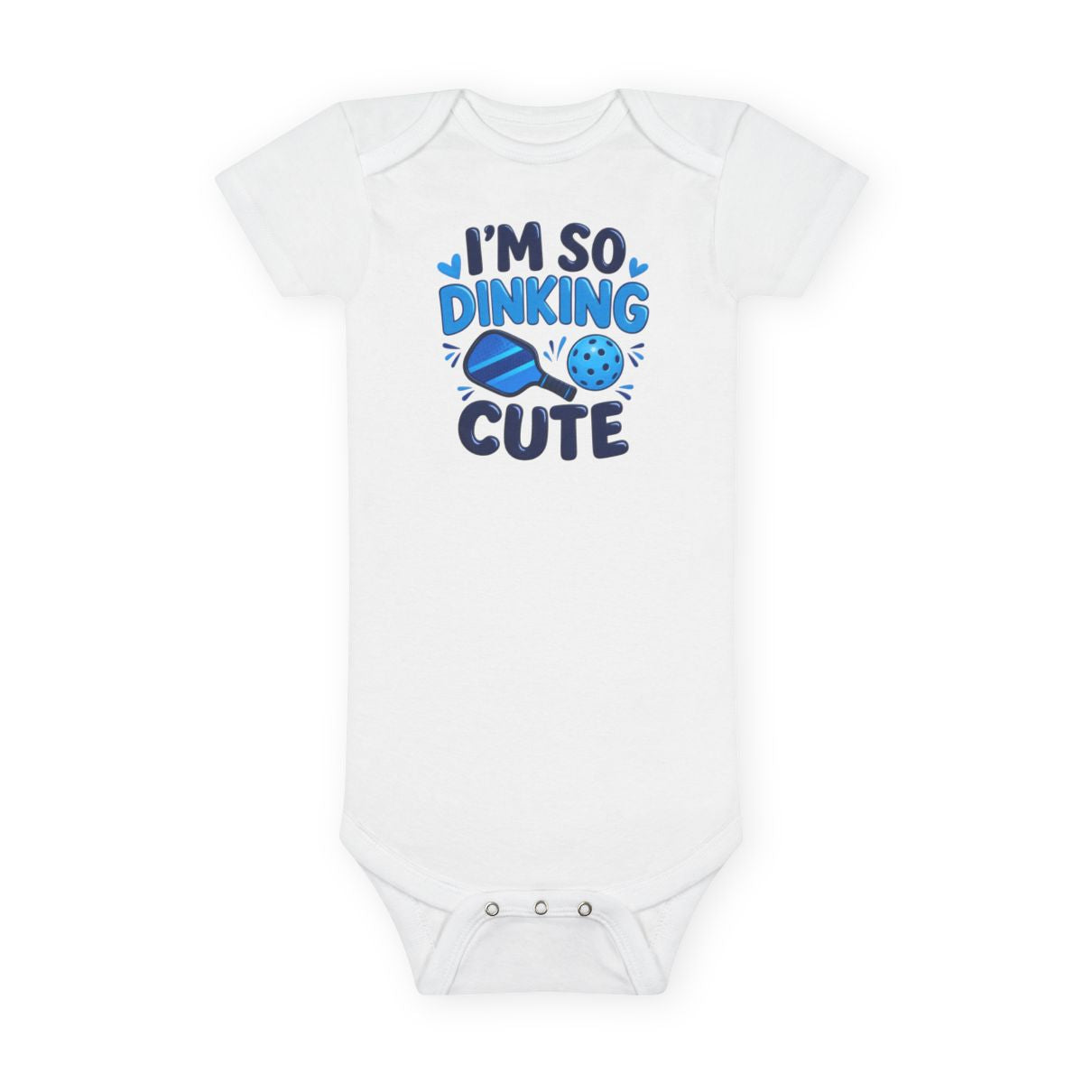 A white short-sleeve baby bodysuit with a blue graphic print on the chest that reads 'I'M SO DINKING CUTE' with a paddle ball graphic, shown on a plain white background.